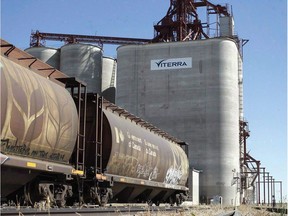 A fire has destroyed a grain elevator in southern Manitoba and left a man in a Winnipeg hospital for treatment of burns.