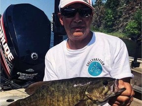 Dan Toth with a beauty small mouth bass.