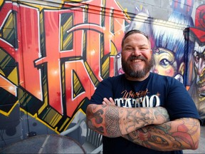 Rich Handford, who is organizing the second annual Winnipeg Tattoo Convention at Red River Exhibition Park this weekend, poses outside his shop, Kapala Tattoo on St. Anne's Road in Winnipeg, on Wed., Aug. 22, 2018. Kevin King/Winnipeg Sun/Postmedia Network