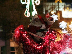 Santa Claus waves to his thousands of fans during the Winnipeg Santa Claus Parade presented by Manitoba Hydro in Winnipeg, Man., on Saturday, Nov.18, 2017. (Brook Jones/Postmedia Network)