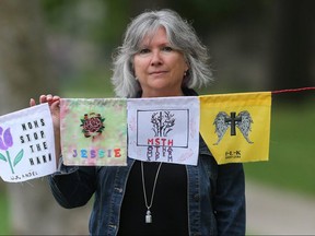 Christine Dobbs has made flags to remember people who have died from, or are struggling with drug related issues. Dobbs says the new treatment centres are a positive development for people struggling with addictions.
Chris Procaylo/Winnipeg Sun files