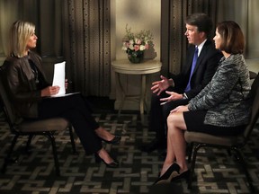 Brett Kavanaugh and his wife Ashley Estes Kavanaugh answer questions during a FOX News interview with Martha MacCallum, Monday, Sept. 24, 2018, in Washington, about allegations of sexual misconduct against the Supreme Court nominee.