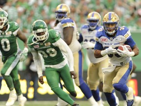 Winnipeg Blue Bombers running back Andrew Harris moves the ball upfield during first half CFL action at the brand new Mosaic Stadium against the Saskatchewan Roughriders, in Regina on Saturday, July 1, 2017. THE CANADIAN PRESS/Mark Taylor ORG XMIT: MT109