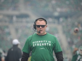 Saskatchewan Roughriders head coach Chris Jones, who usually only wears black, sports a Diversity is Strength T-Shirt during Labour Day CFL action against the Winnipeg Blue Bombers, at Mosaic Stadium in Regina on Sunday, Sept. 2, 2018. THE CANADIAN PRESS/Mark Taylor ORG XMIT: MT121