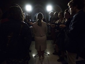 Minister of Foreign Affairs Chrystia Freeland speaks to reporters in the foyer of the House of Commons following a cabinet meeting on Parliament Hill in Ottawa on Tuesday, Sept. 18, 2018. Freeland is back in Washington and back in search of a way to bridge the divide that's keeping Canada out of a new North American free trade pact. THE CANADIAN PRESS/Sean Kilpatrick ORG XMIT: CPT301