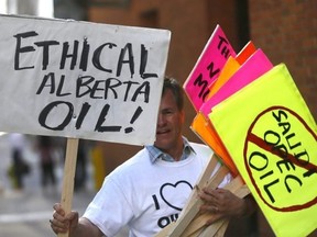 Nearly 100 supporters gathered outside the conference centre hosting the Kinder Morgan annual general meeting in downtown Calgary on Wednesday, May 16, 2018, to show their unwavering support for the Trans Mountain pipeline.