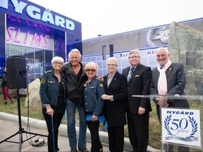 Peter Nygard, second from left, hosted an event at the company's 1771 Inkster Boulevard location Wednesday to kick of his company's 50th anniversary celebration. With him are: Rene Law, Irene Golinski, Former Lieutenant Governor of Manitoba Pearl McGonigal, MLA for St. James Scott Johnston and vice-chairman of Nygard International Jim Bennett.