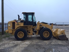 Police say a front-end loader, similar to the one pictured here, was stolen over the weekend. Police are asking for the public's help in tracking it down. Handout.