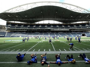 The Winnipeg Blue Bombers loosen up during practice at Investors Group Field on Tues., July 24, 2018. Kevin King/Winnipeg Sun Files