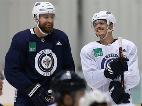 Winnipeg Jets captain Blake Wheeler (left) shares a laugh with Jack Roslovic during a skate at Bell MTS Iceplex in Winnipeg on Tues., Sept. 4, 2018. Kevin King/Winnipeg Sun/Postmedia Network