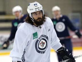 Winnipeg Jets forward Mathieu Perreault heads for the bench during an informal workout at Bell MTS Iceplex in Winnipeg on Mon., Sept. 10, 2018. Kevin King/Winnipeg Sun/Postmedia Network