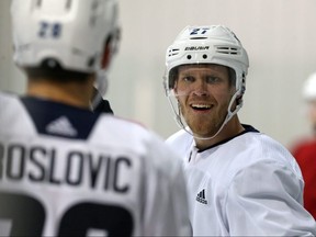 Nikolaj Ehlers (right) gives Jack Roslovic a look during Winnipeg Jets training camp at Bell MTS Iceplex in Winnipeg on Mon., Sept. 24, 2018. Kevin King/Winnipeg Sun/Postmedia Network