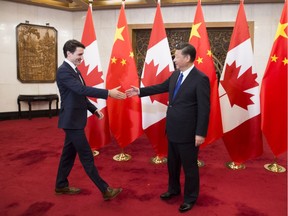 Best buddies: Prime Minister Justin Trudeau meets Chinese President Xi Jinping at the Diaoyutai State Guesthouse in Beijing, China on Dec. 5, 2017.