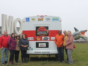 Nine sponsors came on board to help fund the Canadian Fossil Discovery Centre's new Mosasaur Machine. CFDC executive director Peter Cantelon is on far left.