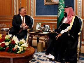 US Secretary of State Mike Pompeo (L) meets with Saudi Crown Prince Mohammed bin Salman in Riyadh, on October 16, 2018. - Pompeo held talks with Saudi King Salman seeking answers about the disappearance of journalist Jamal Khashoggi, amid US media reports the kingdom may be mulling an admission he died during a botched interrogation.