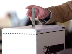 A voter casts a ballot.
