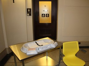 A baby change table and yellow nursing chair have been added to two bathrooms in the basement of the Manitoba Legislature as part of an effort to make the building more family friendly, the provincial government announced on Tuesday, Oct. 9, 2018. 
JOYANNE PURSAGA/Winnipeg Sun
