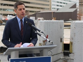 Incumbent mayoral candidate Brian Bowman speaks during a press conference on Friday, Oct. 19, 2018 in front of the Main Street construction site of a future 40-storey mixed-use building. Bowman said his re-election campaign sets out a vision to grow Winnipeg.  JOYANNE PURSAGA/Winnipeg Sun/Postmedia Network