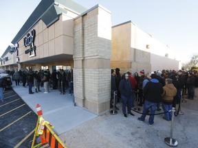 Hundreds of people line up outside a cannabis store to buy their first legal gram of marijuana in Winnipeg on Wednesday, Oct. 17 when marijuana became legal in Canada.