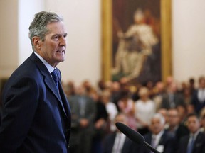 The Manitoba government says it is pulling out of its plan to charge a carbon tax and is joining the number of provinces opposed to the federal government's demands. Manitoba Premier Brian Pallister speaks during his cabinet shuffle at the Manitoba Legislature in Winnipeg on Wednesday, Aug. 1, 2018. Pallister says the federal government has not respected the province's right to come up with its own plan with a lower rate.
