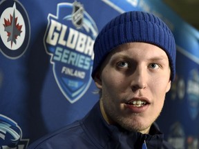 Finnish forward Patrik Laine of Winnipeg Jets attends a press conference in Helsinki, Finland, Sunday Oct. 28, 2018 ahead of their ice hockey NHL Global Series matches against Florida Panthers at the end of the week.