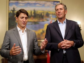 Prime Minister Justin Trudeau and Premier Brian Pallister at the Manitoba Legislative Building,Tuesday, September 11, 2018. THE CANADIAN PRESS/Trevor Hagan ORG XMIT: wpgt117