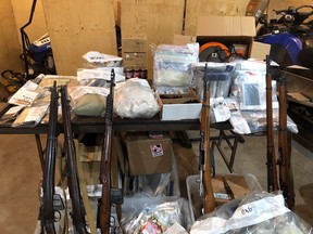Flin Flon RCMP seized guns, drugs and cash at a local home on Sept. 26, 2018.
Handout