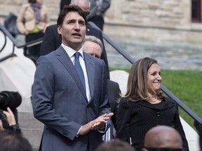 Prime Minister Justin Trudeau and Minister of Foreign Affairs Chrystia Freeland walk to a press conference on the USMCA trade deal on Parliament Hill in Ottawa on Monday, Oct. 1, 2018.