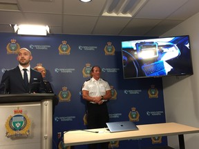 HealthIM representative Daniel Pearson Hirdes gives a presentation on the HealthIM risk assessment tool to be installed in patrol cars and on other mobile devices in nine Manitoba police agencies including the Winnipeg Police Service, Brandon Police Service and RCMP detachments in Steinbach, Thompson and Portage la Prairie at a press conference at Winnipeg Police Service headquarters on Monday.
