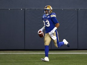 Winnipeg Blue Bombers RB Andrew Harris runs toward the stands after his touchdown reception during CFL action against the Montreal Alouettes in Winnipeg on Fri., Sept. 21, 2018. Kevin King/Winnipeg Sun/Postmedia Network