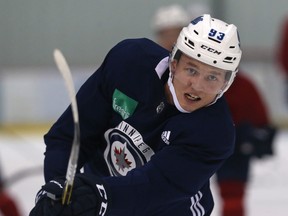 Kristian Vesalainen works on his shot during Winnipeg Jets practice at Bell MTS Iceplex on Mon., Oct. 1, 2018. Kevin King/Winnipeg Sun/Postmedia Network