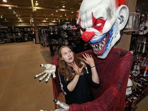 Jessica Dahlen recoils in fear at Halloween Alley's clearance centre on St. James Street.