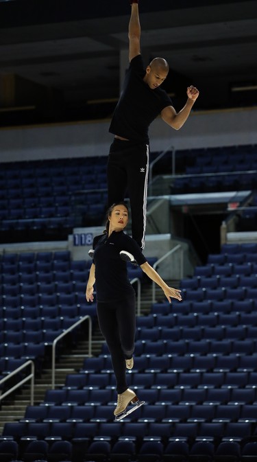 An aerialist and skater rehearse for Crystal, a Cirque du Soleil production that combines aerial acrobatics with figure skating, at Bell MTS Place in Winnipeg on Wed., Oct. 3, 2018. The show runs from Oct. 3-7. Kevin King/Winnipeg Sun/Postmedia Network