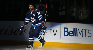 Winnipeg Jets defenceman Dustin Byfuglien is introduced to the crowd before the team's home opener against the Los Angeles Kings in Winnipeg on Tues., Oct. 9, 2018. Kevin King/Winnipeg Sun/Postmedia Network