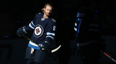 Winnipeg Jets forward Kyle Connor takes his place around centre ice during the team introduction prior to the home opener against the Los Angeles Kings in Winnipeg on Tues., Oct. 9, 2018. Kevin King/Winnipeg Sun/Postmedia Network