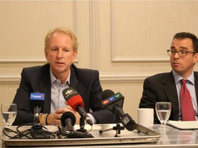 Gem Equities owner Andrew Marquess (left) speaks during a press conference on Tuesday to announce a lawsuit against four senior city officials over their alleged abuse of power related to the Parker Lands development process.