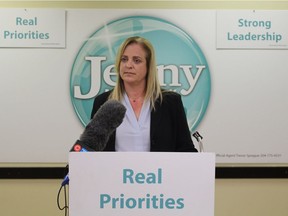 Mayoral candidate Jenny Motkaluk speaks to media on Tuesday, about her pledge to audit recent water and sewer rate hikes and freeze future increases, if elected.