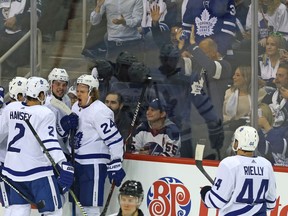 Toronto Maple Leafs forward Kasperi Kapanen (second from right) celebrates his goal against the Jets in Winnipeg on Wed., Oct. 24, 2018 with Patrick Marleau, Ron Hainsey, Auston Matthews and Morgan Rielly (from left). Kevin King/Winnipeg Sun/Postmedia Network
