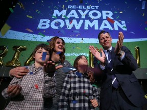 Mayor Brian Bowman (right), with wife Tracy and children Hayden (second from right) and Austin, celebrates his re-election at the Metropolitan Entertainment Centre in downtown Winnipeg on Wed., Oct. 24, 2018. Kevin King/Winnipeg Sun/Postmedia Network