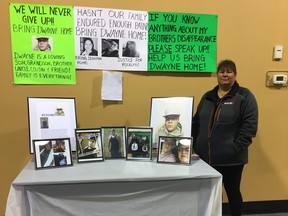 Kelly Lavallee, the mother of Dwayne Lavallee, at a table with photos and posters of the missing 21-year-old. Lavallee from a northern Manitoba First Nation has been missing since late September. He was last seen in the Ebb and Flow First Nation on September 22, 2018. Ebb and Flow First Nation is about 180 km northwest of Winnipeg.