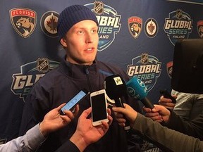 Winnipeg Jets forward Patrik Laine meets the media at a press conference in Helsinki, Finland, on Sunday, Oct. 28, 2018 and discusses what it means to play NHL games in his home country.