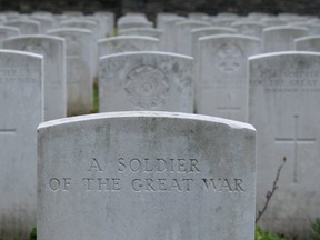 A gravestone marks the resting place of an unidentified soldier at the Canadian Cemetery near Vimy Ridge, France, Saturday November 10, 2018. (THE CANADIAN PRESS/Adrian Wyld)