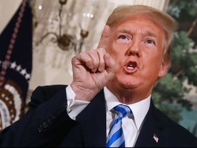 U.S. President Donald Trump announces his decision to withdraw the United States from the 2015 Iran nuclear deal in the Diplomatic Room at the White House May 8, 2018 in Washington, DC.