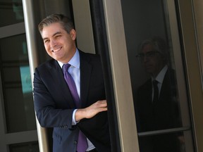 CNN White House correspondent Jim Acosta leaves US District Court in Washington, DC, on November 16, 2018. - Judge Timothy Kelly ordered the White House on November 16, 2018, to reinstate Acosta's press credentials, whose pass was revoked after a heated exchange with US President Donald Trump, the network said. Kelly issued a temporary restraining order that requires the White House to restore Acosta's access until a full hearing is held, according to CNN.