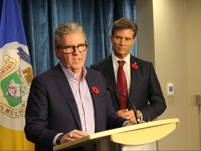 Outgoing Winnipeg police board chair David Asper (left) and Kevin Klein, the nominee to take over the role, speak to media at City Hall on Friday, Nov. 9, 2018. 
JOYANNE PURSAGA/Winnipeg Sun/Postmedia Network