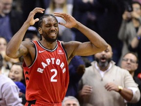 Toronto Raptors forward Kawhi Leonard (2) reacts after knocking the ball out of bounds with two seconds left in a tie game against the Detroit Pistons during second half NBA basketball action in Toronto on Wednesday, Nov. 14, 2018. THE CANADIAN PRESS/Frank Gunn