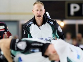 Skip Brad Jacobs of Sault Ste. Marie, Ont., yells instructions during the third draw at the Grand Slam of Curling's Princess Auto Elite 10 at Thames Campus Arena in Chatham, Ont., on Sept. 27, 2018.