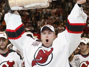 Former New Jersey Devils goaltender Martin Brodeur was great in goal, but, “he could be the third defenceman on the ice,” according to Leafs great Wendel Clark. (The Canadian Press)