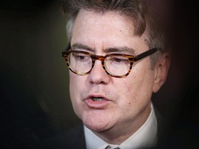 Manitoba Liberal Leader Dougald Lamont speaks to media outside the legislature after the provincial throne speech was read at the Manitoba Legislature in Winnipeg, Tuesday, November 21, 2017. Lamont says politicians accused of inappropriate behaviour should face possible suspension from the legislature.THE CANADIAN PRESS/John Woods