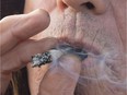 A man smokes a marijuana joint in Kamloops, B.C.